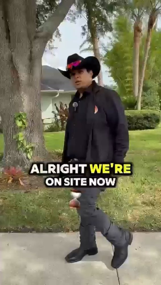 Hugo team member walking outside a property